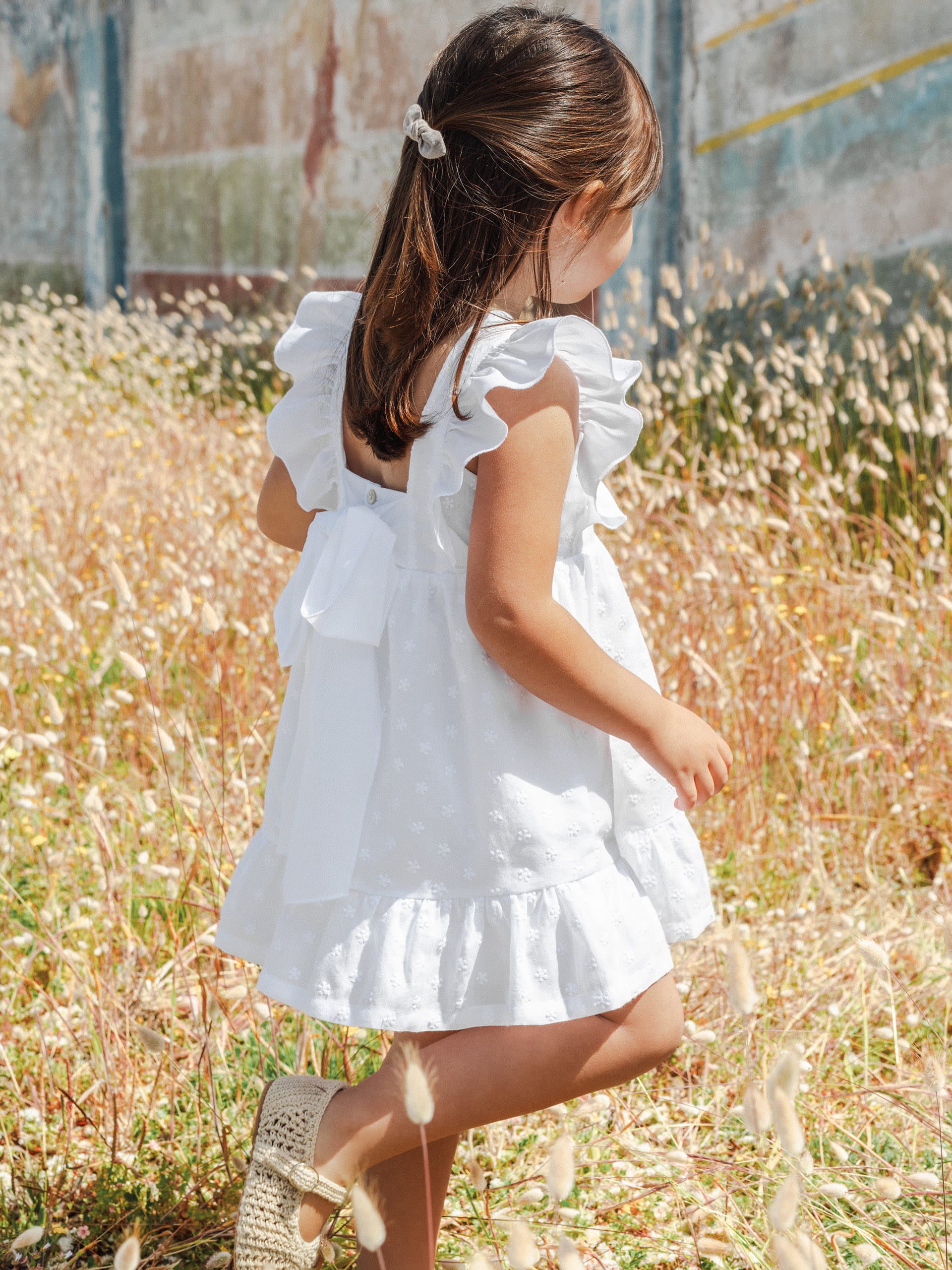 Robe fleurie brodée avec nœud dans le dos