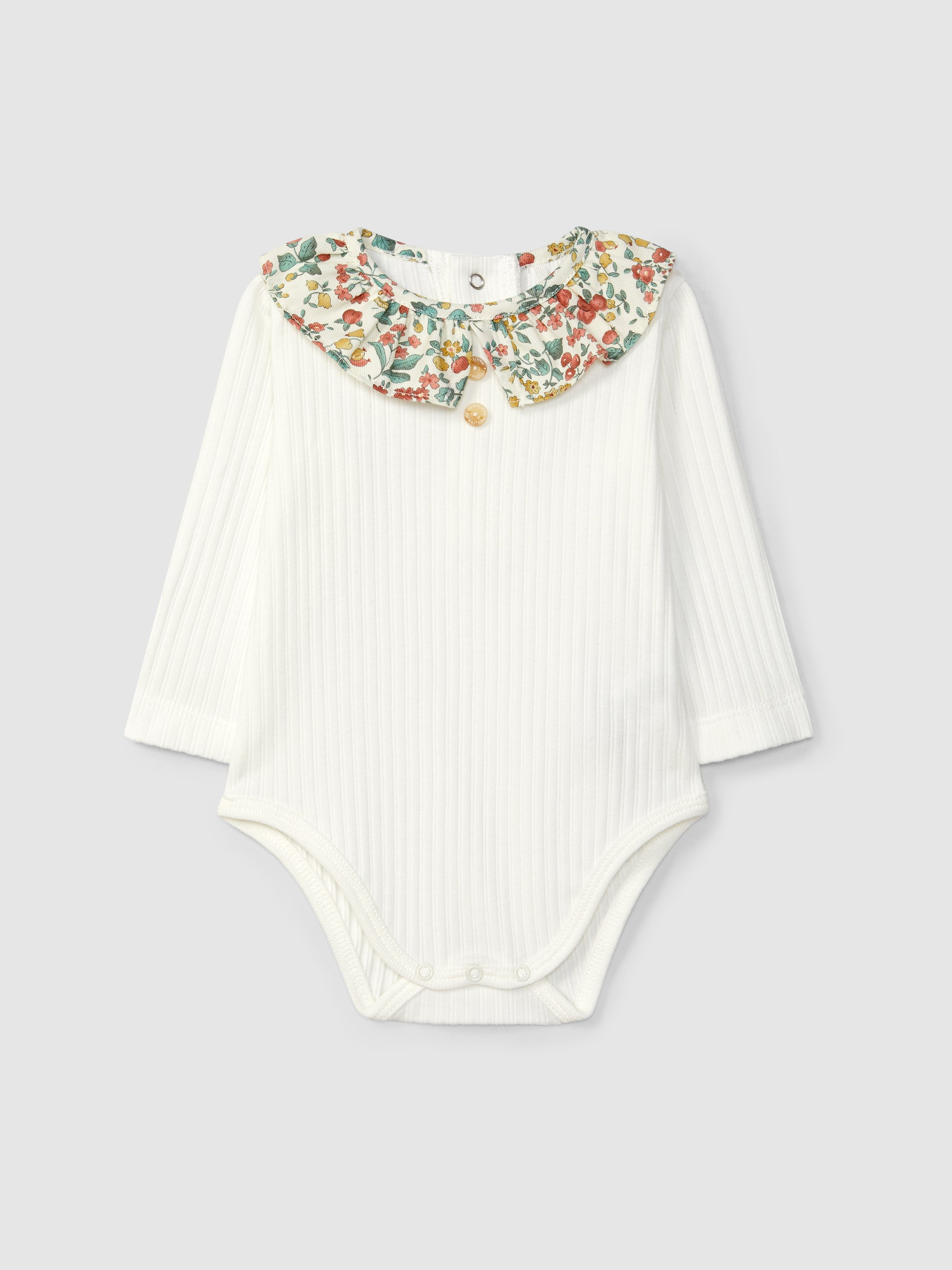 Body en maille côtelée avec col à volants fleuris