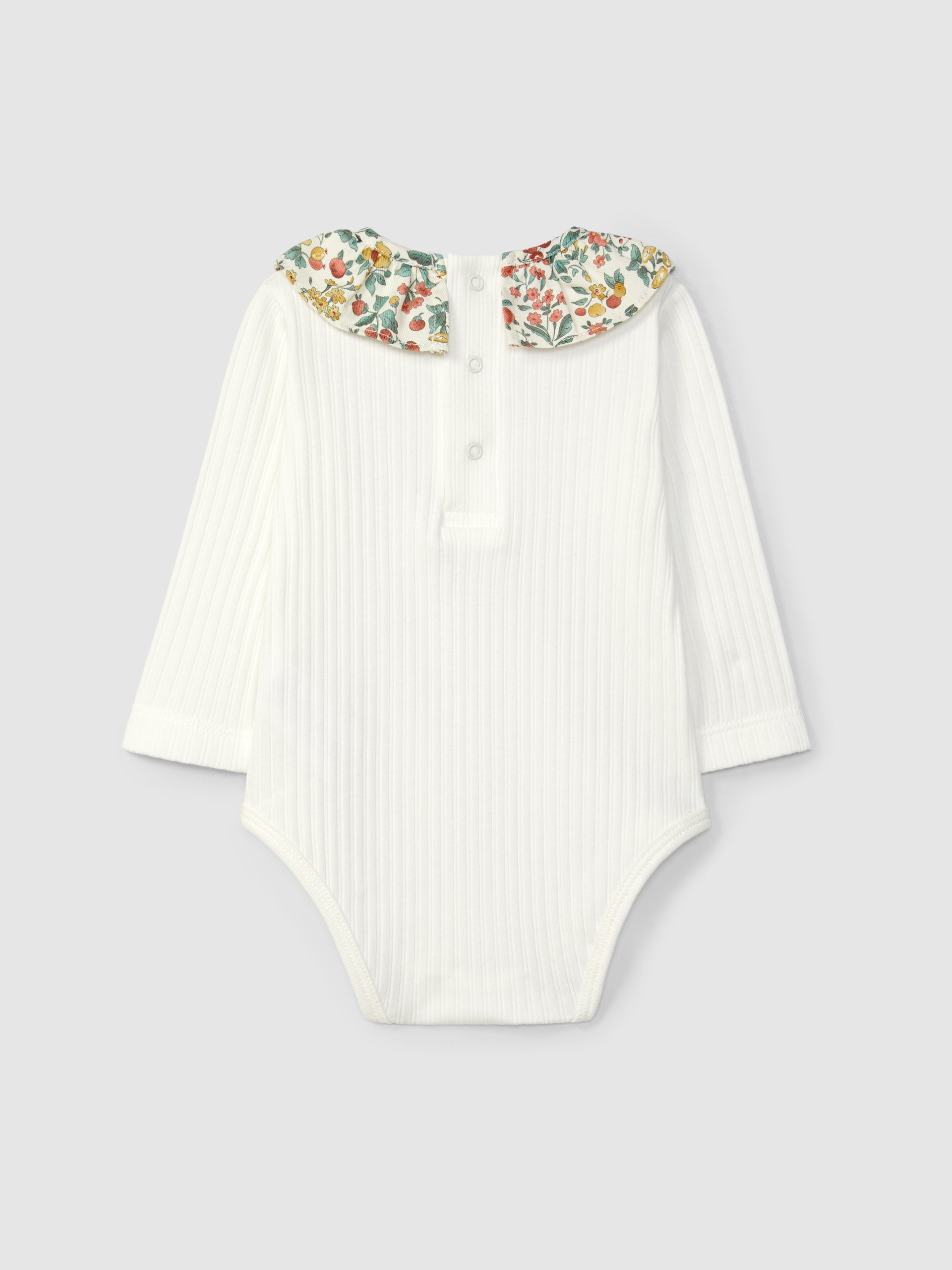 Body en maille côtelée avec col à volants fleuris