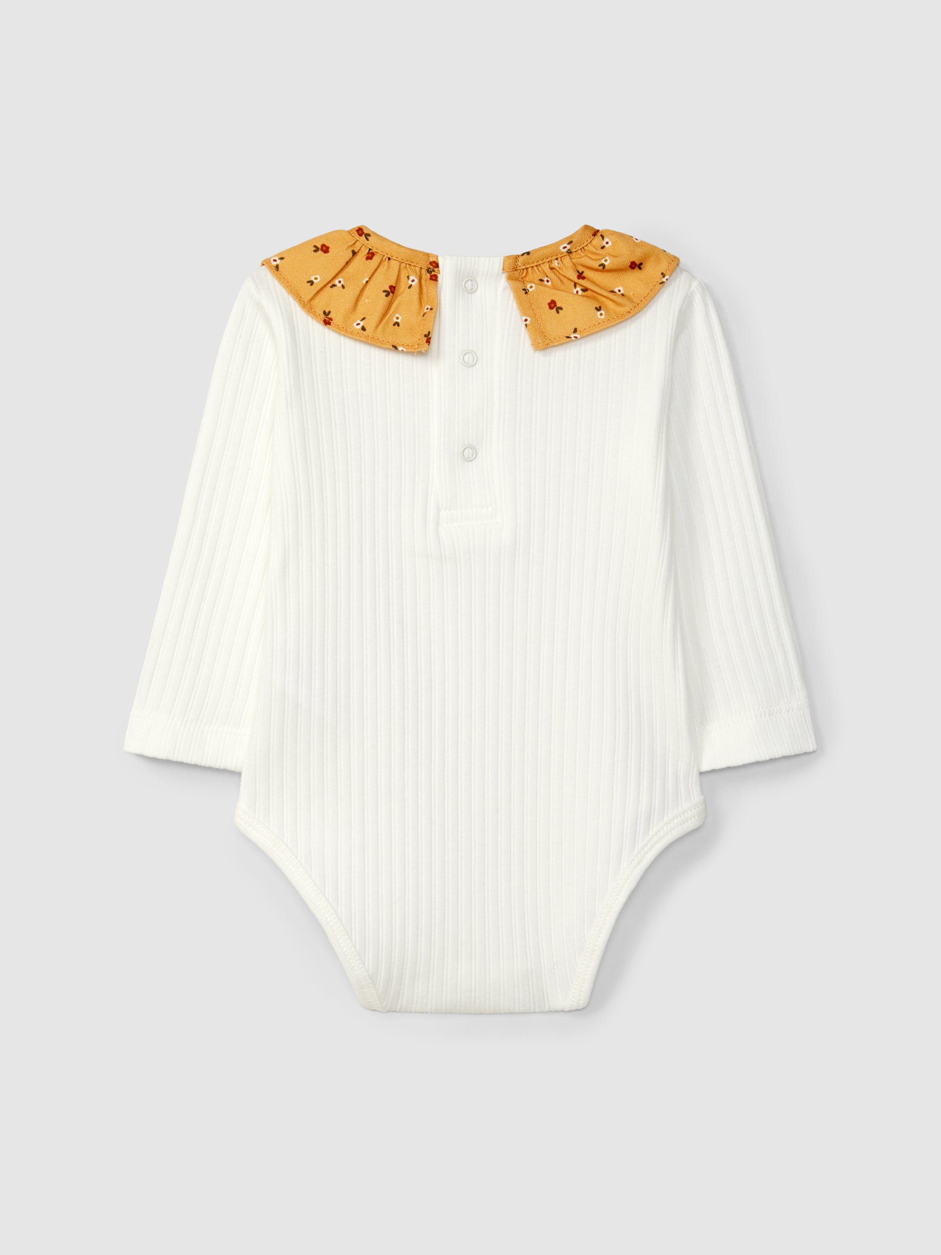 Body en maille côtelée avec col à volants fleuris