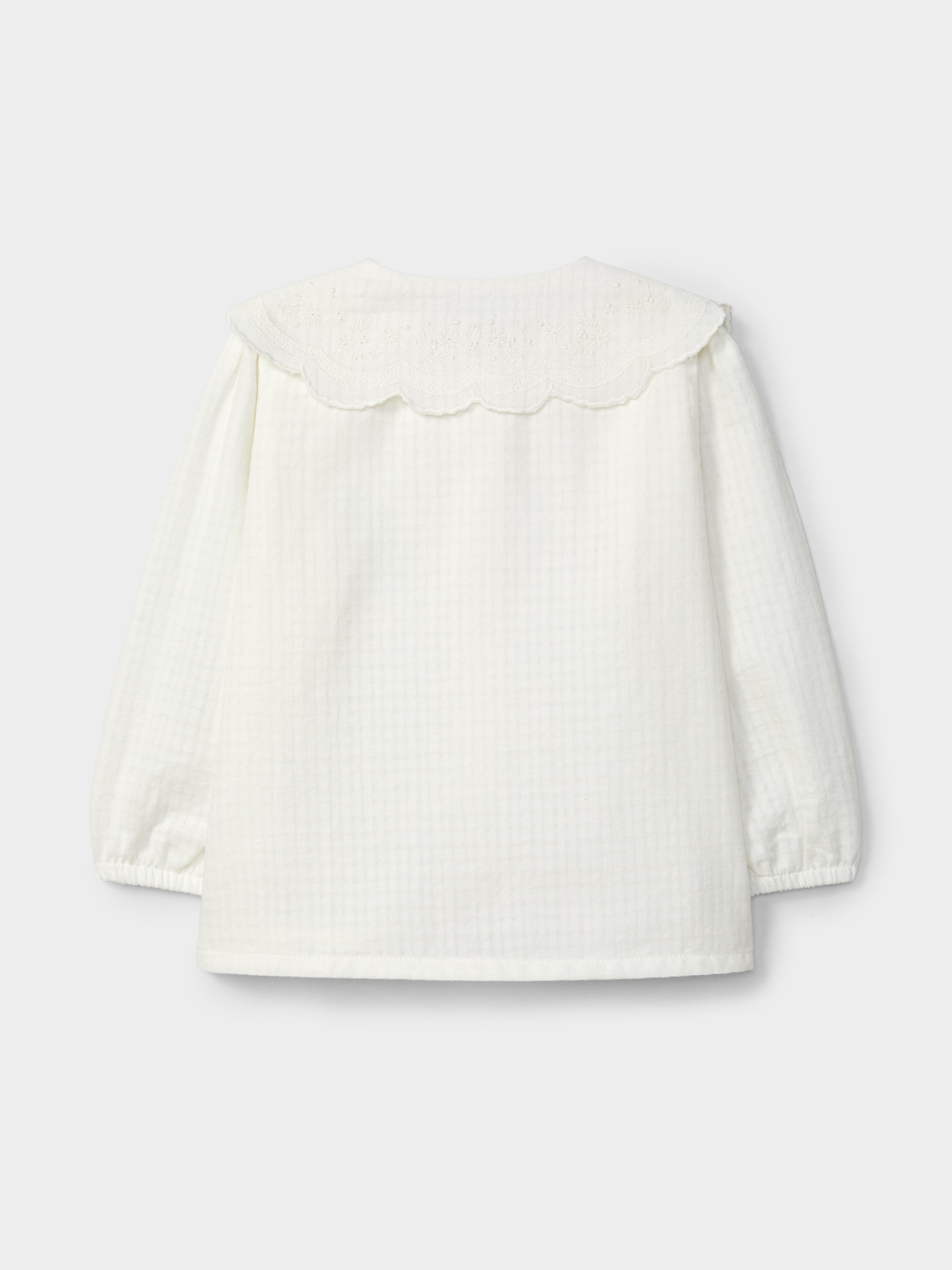 Blusa em Tecido Texturado Bordado Inglês