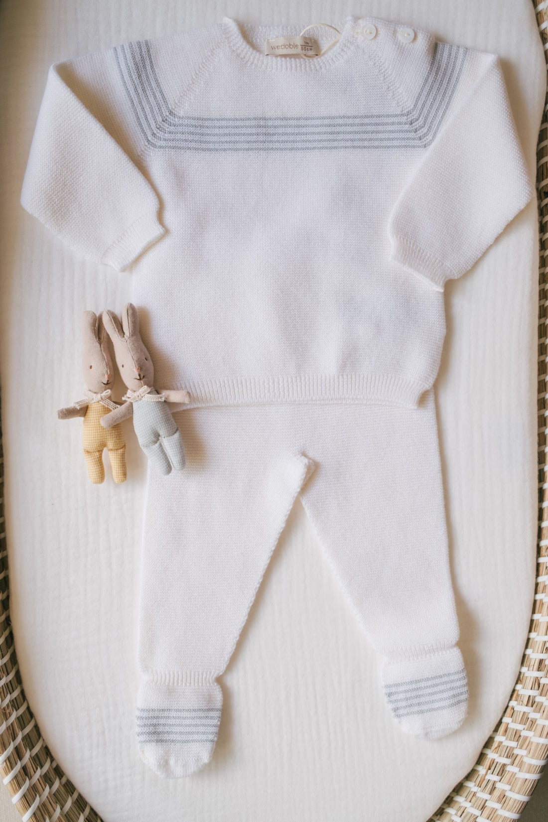 Pantalon à pieds en tricot rayé