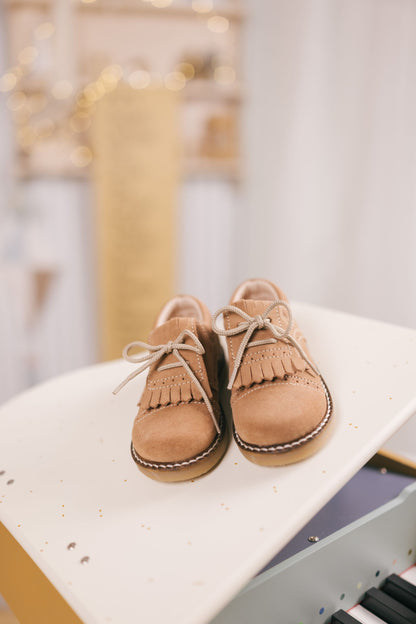 peau de mouton à franges