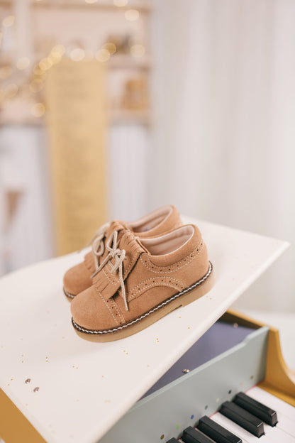 peau de mouton à franges