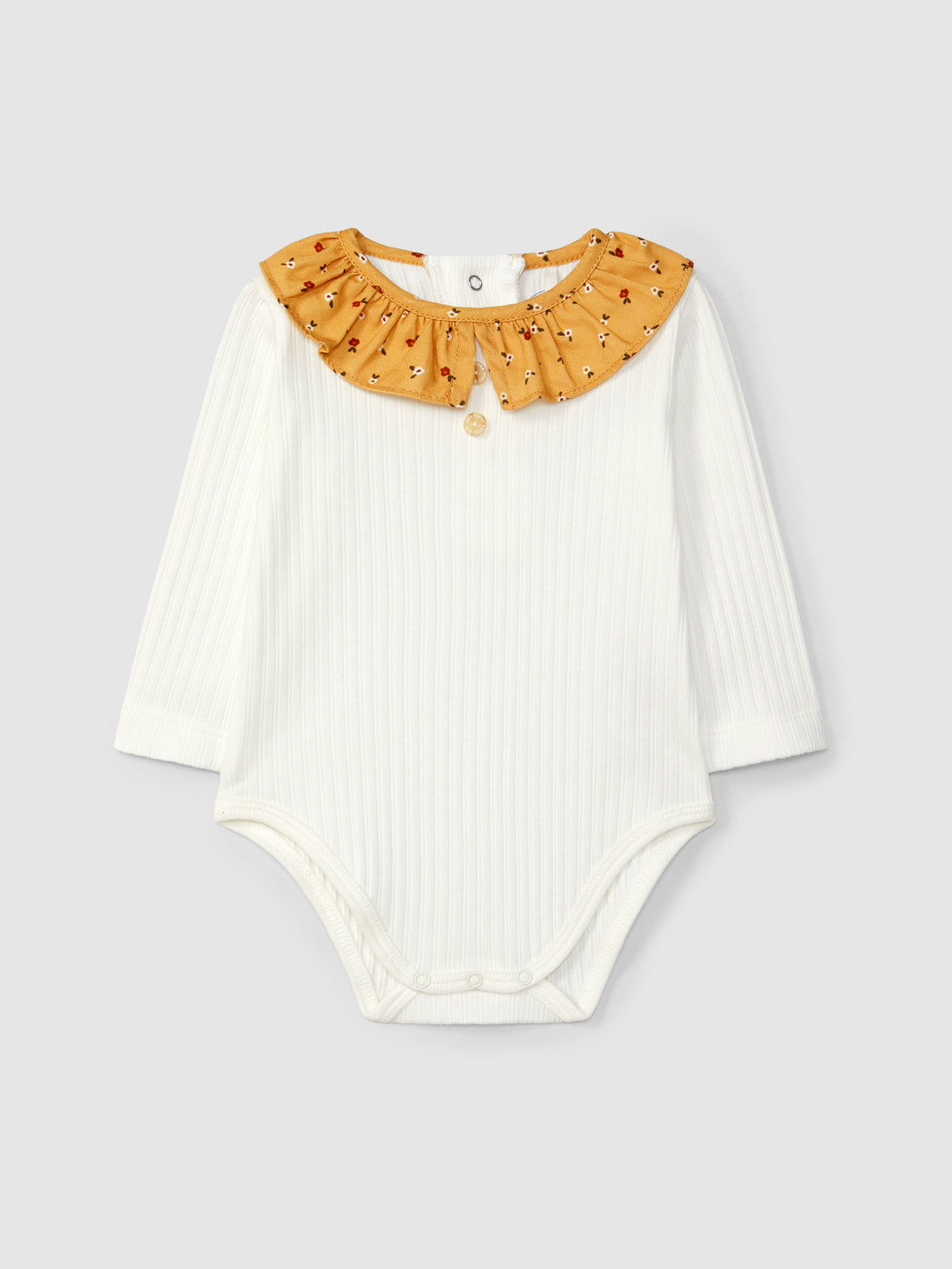 Body en maille côtelée avec col à volants fleuris