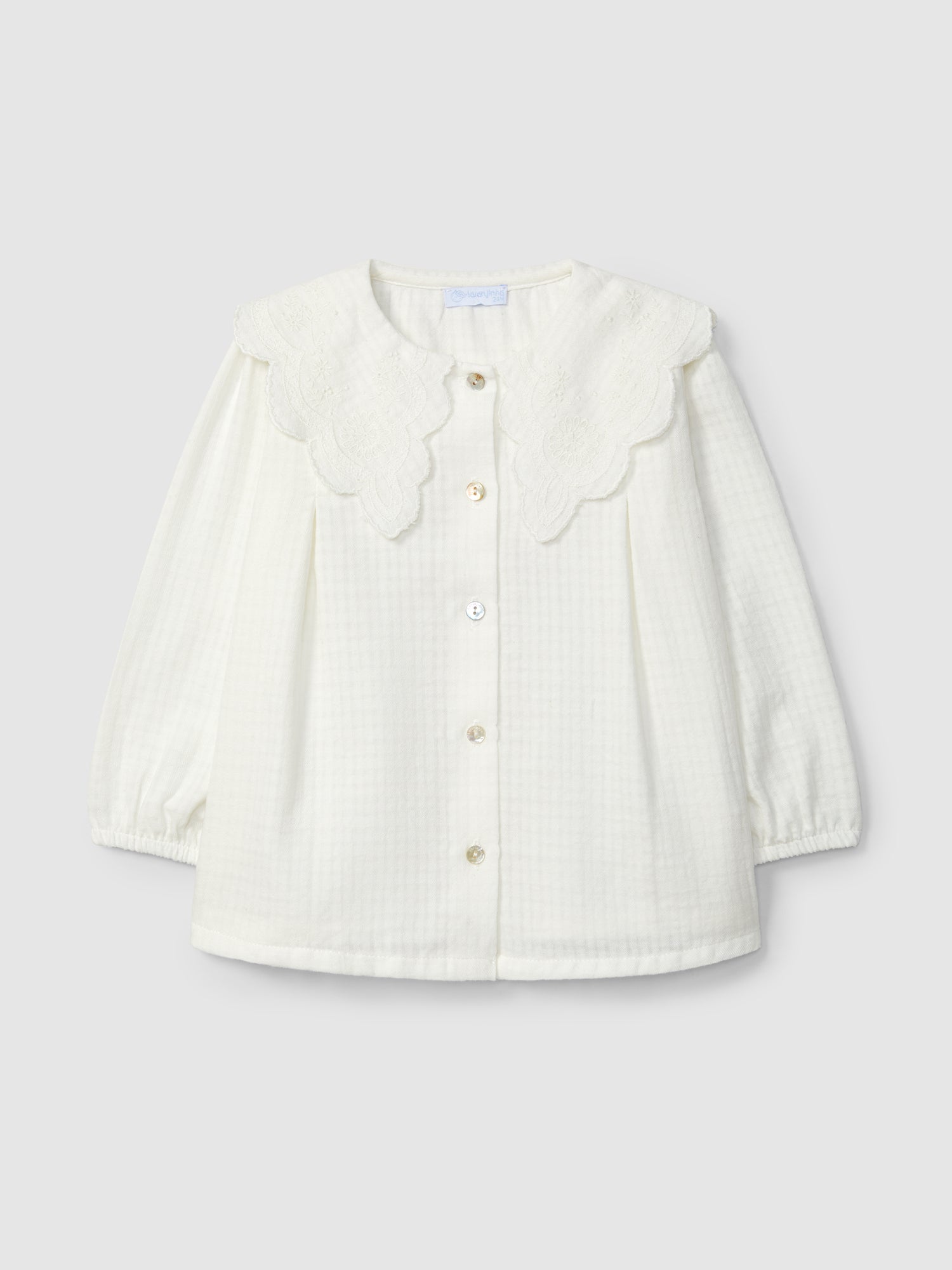 Blusa em Tecido Texturado Bordado Inglês