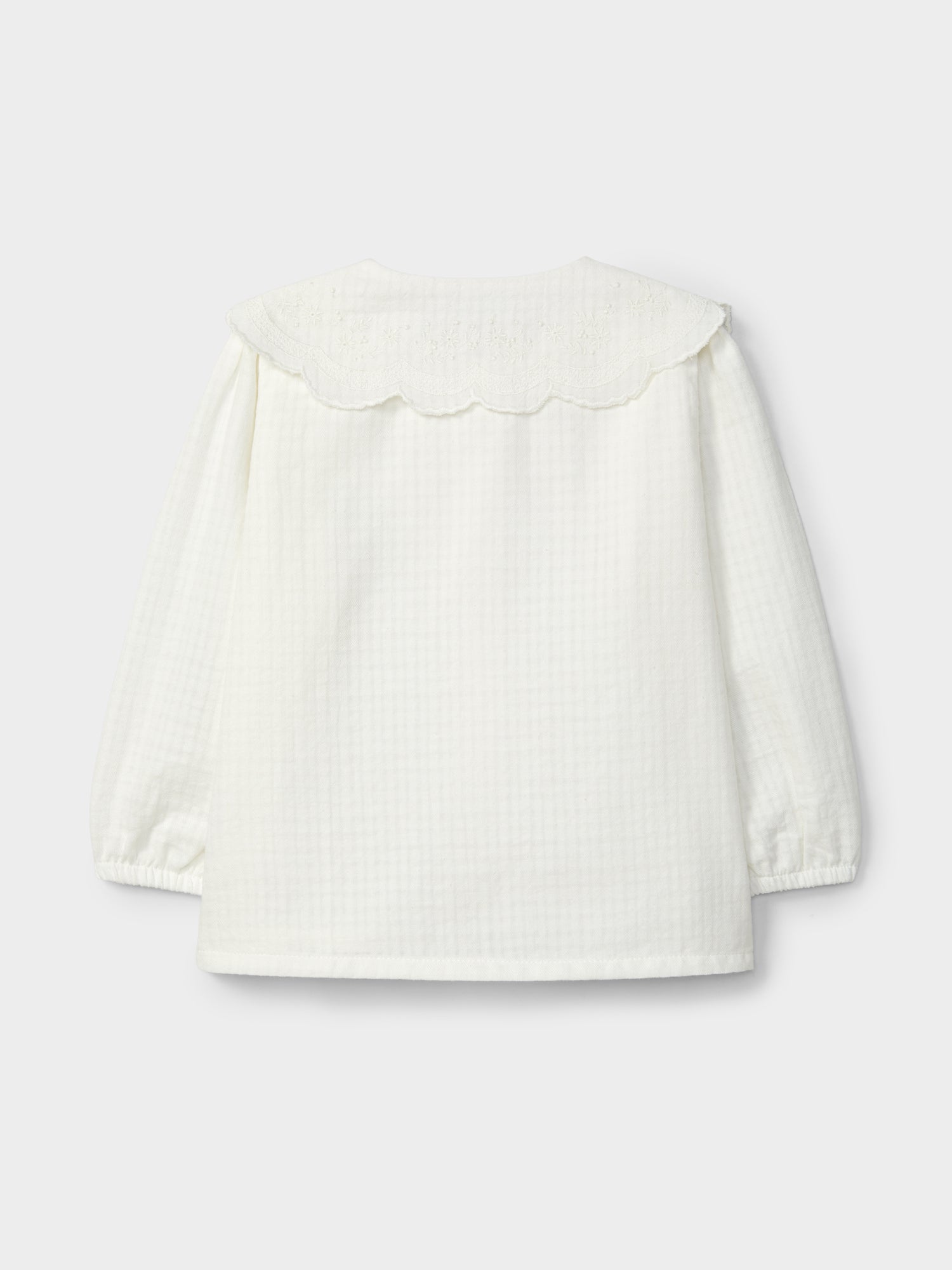 Blusa em Tecido Texturado Bordado Inglês
